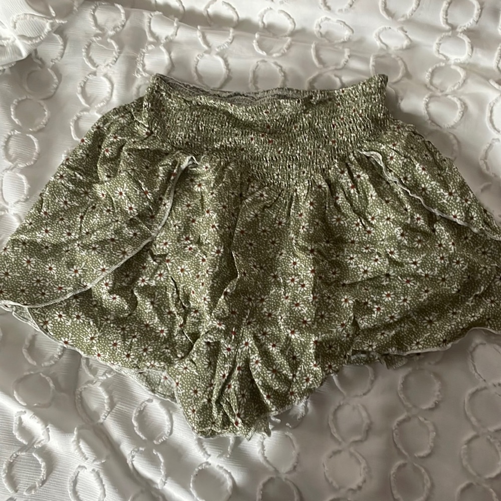 Green flowered shorts